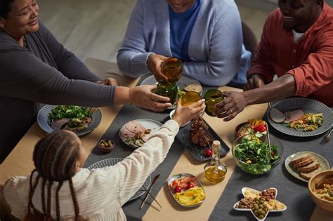 Premium Photo | Black family enjoying dinner together