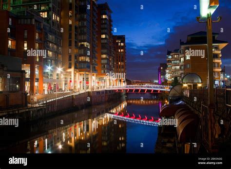 Architectural bridges and piers. Modern, gentrification, River Irwell, Manchester, new builds ...