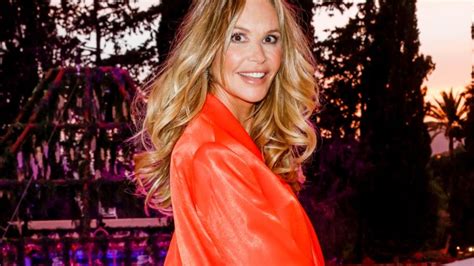 Elle Macpherson Looks Amazing In Only Bikini Bottom And Shirt Photo