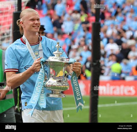 Manchester City S Erling Haaland With FA Cup Trophy During The Emirates