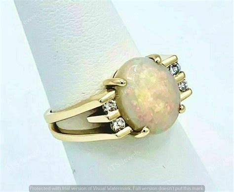 Ct Oval Cut Lab Created Fire Opal Women S Ring K Yellow Gold