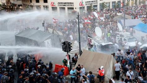 Lebanon Police Uses Gunfire Tear Gas Water Cannons To Fights ‘you