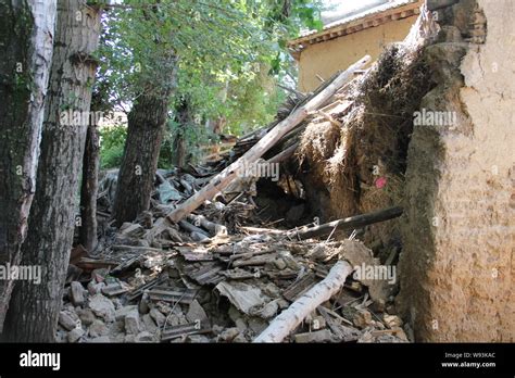 Collapsed Houses Are Pictured After The Magnitude Earthquake In