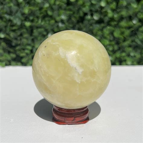 Golden Calcite Crystal Sphere The Crystal Society Pty Ltd