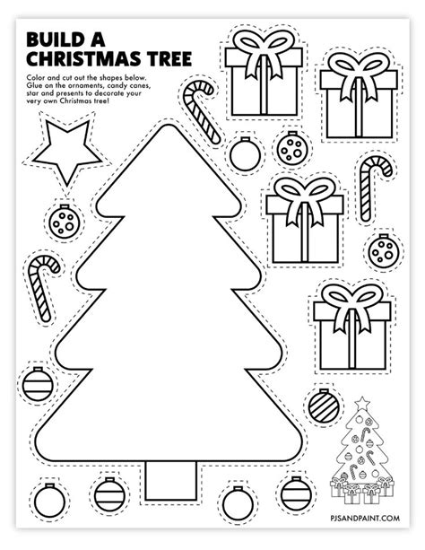 A Christmas Tree Cut Out From Paper With Ornaments And Decorations