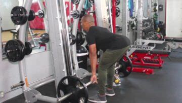 How to Do the Smith Machine Deadlift for Strength, Skill, and Muscle | BarBend