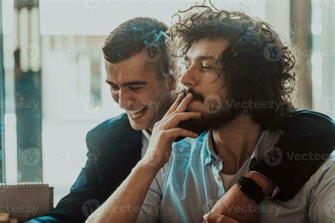 Portrait Of Multiethnic Diverse Gay LGBT Romantic Male Couple Embracing And Showing Their Love