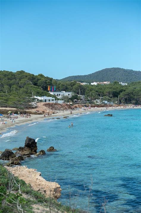 Panorama On The Tourist Beach Of Cala Nova On The Island Of Ibiza In