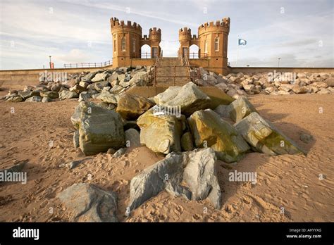 September 2007 Pier Towers and granite defence boulders Withernsea seafront East Yorkshire UK ...