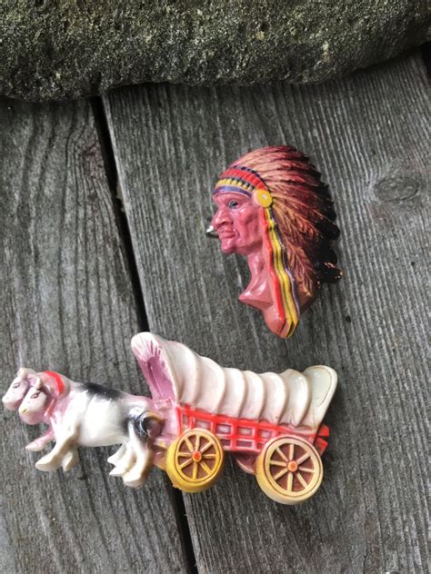 Two Vintage Western Themed Pins A Chuckwagon Or Covered Wagon And A