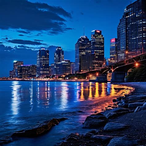 Image of the Buffalo City skyline at night with the text "Bu... by ...