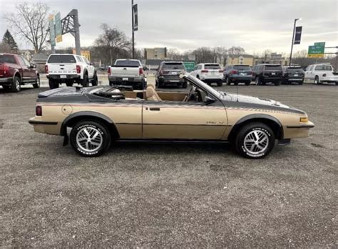 This 1986 Pontiac Sunbird Convertible For Sale Is Golden