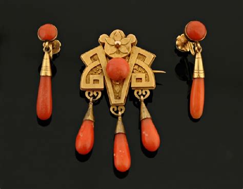 An Art Deco Coral Brooch And Earrings The Brooch Comprising An The