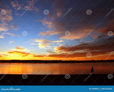 Person Walking on a Beach at Sunrise Stock Image - Image of love, colorful: 1449441