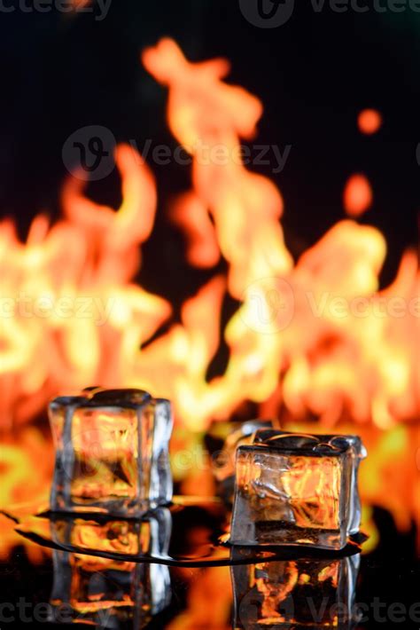 Cubes Of Ice And Fire On A Water Surface On An Abstract Background