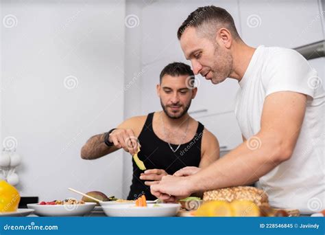 Gay Couple Cooking Healthy Vegan Food Together At Home Stock Image Image Of Apartment