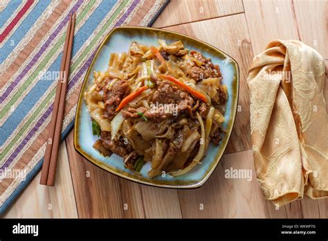 Stir Fried Chinese Beef Chow Fun With Hor Fun Wide Rice Noodles Cabbage