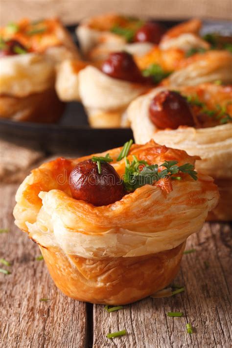 Muffins Of Puff Pastry With Sausage And Cheese Close Up Horizon Stock