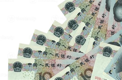 10 Chinese yuan bills lies in different order isolated on white. Local ...