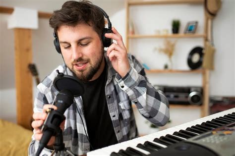 Free Photo Medium Shot Young Man Making Music