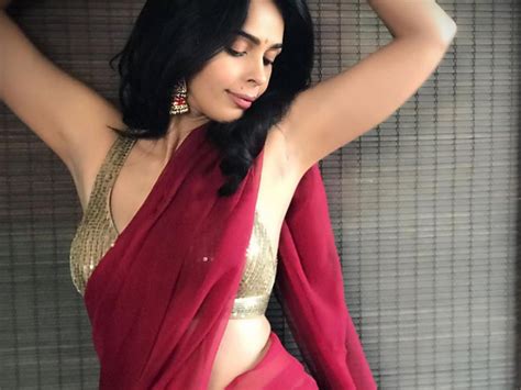 Actress Mallika Sherawat Hot Pics In Saree Gallery