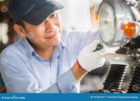 He Fixing Motorbike Stock Photography CartoonDealer 211992854