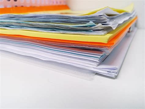 Premium Photo Close Up Of Papers On Table