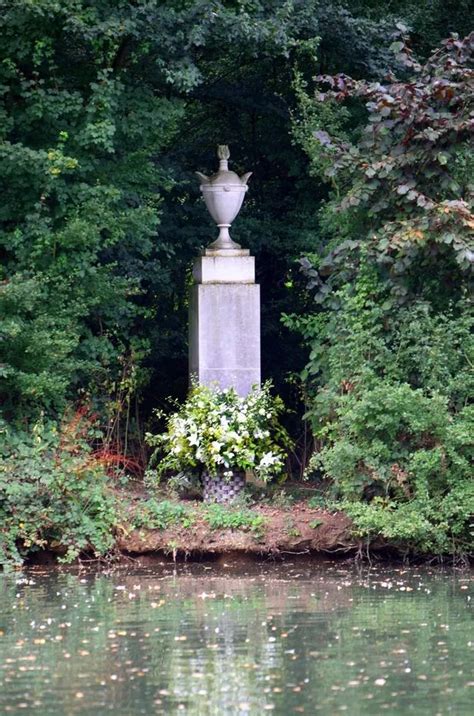 Princess Diana's grave 18 years on is coated in greenery as estate lets ...