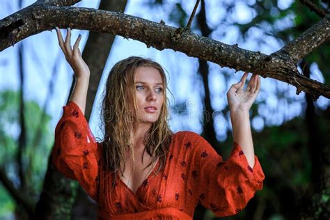 Blonde Woman In Red Wet Dress At Rainig Day Stock Photo Image Of Beauty Cute