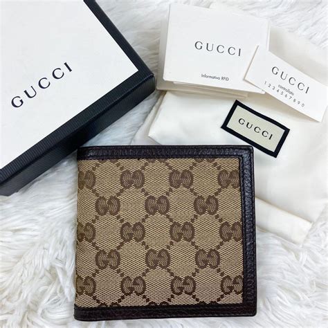 人気ブランドを 極美品 現行⭐️グッチ グッチ Gucci Ggキャンバス 2つ折り財布 ブランド ブラウン レザー 箱付き 二つ折り財布