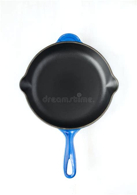 Blue Empty Cast Iron Frying Pan On White Background Top View Stock