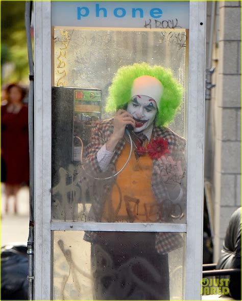 Joaquin Phoenix Dresses In Full Joker Clown Costume For Phone Booth