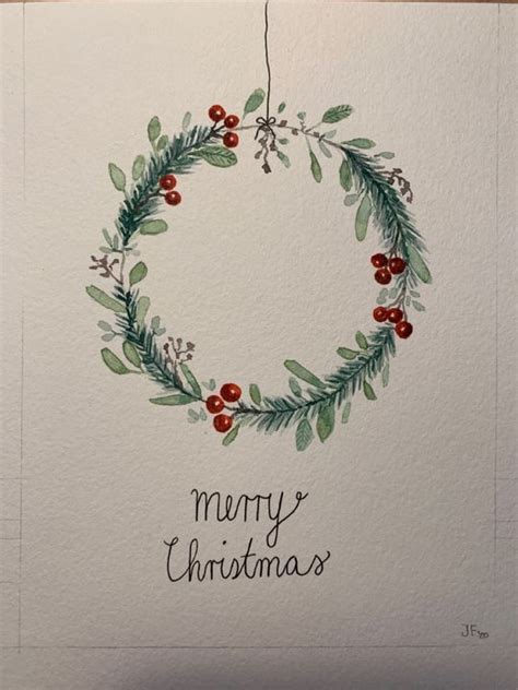 A Watercolor Christmas Card With A Wreath And Berries On The Front That