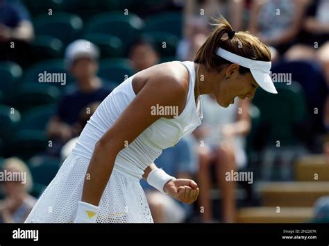 Garbine Muguruza Of Spain Celebrates Winning A Point Against Caroline