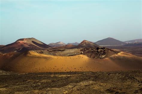 Premium Photo | Active volcano at timanfaya national park against sky