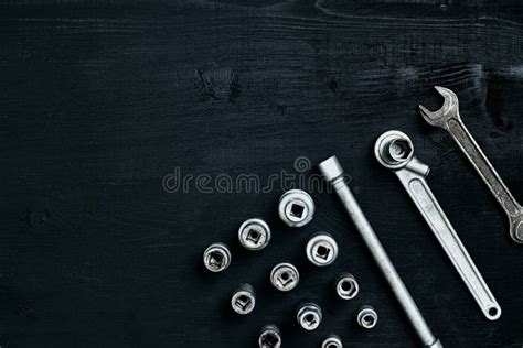 Tools for Car Repair in Workshop. Car Repair Equipment on Black Wooden ...