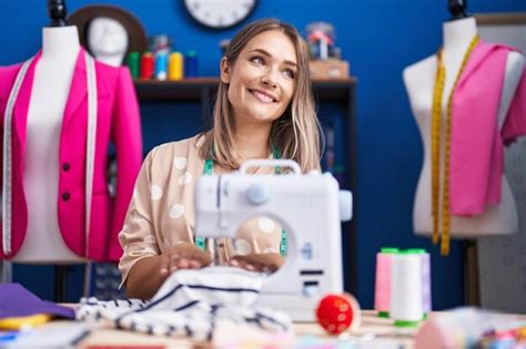 Premium Photo Young Caucasian Woman Tailor Smiling Confident Using