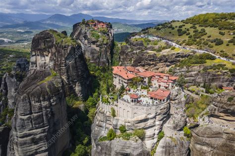Aerial view of monastery on rock formation in Meteora, Greece - Stock