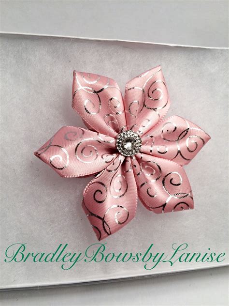 Pink Flower Hair Bow With Spiral Design By Bradleyaccessories