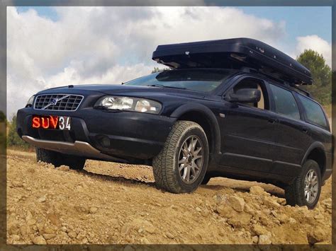 Volvo XC70 Lift Kit Off Road With A Large Rooftop Tent Hussarde Quatro