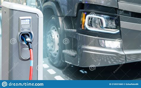 Electric Truck with Charging Station Stock Photo - Image of cable ...