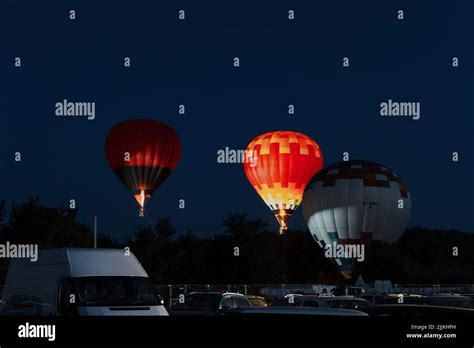 Hot Air Balloons Risen Up At A Music Festival At Night Stock Photo Alamy