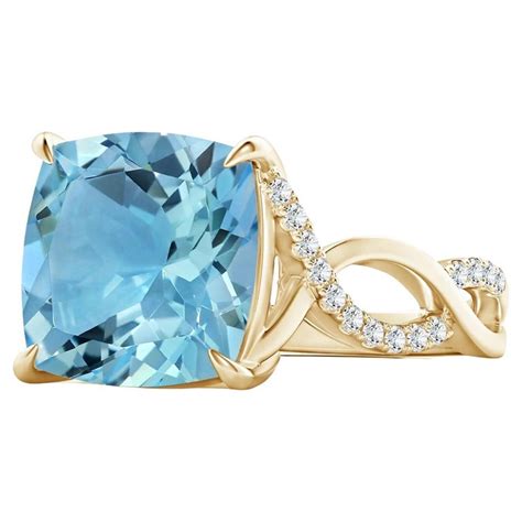 Customizable Gia Certified Natural Sky Blue Topaz Twist Infinity Ring In Yellow Gold For Sale At