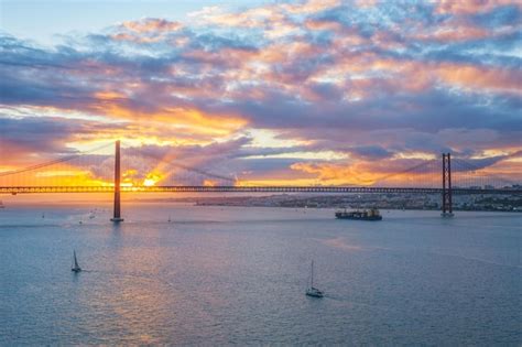 Premium Photo View Of De Abril Bridge Famous Tourist Landmark Of