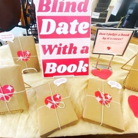 Some Brown Bags With Red Hearts On Them And A Sign That Says Blind Date