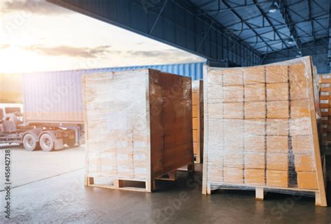 Packaging Boxes Stacked On Pallets Loading With Shipping Cargo