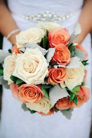 Bouquets Of Rose Hypercium Berries And Dusty Miller