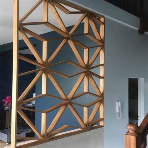 A Room Divider Made Out Of Wood With Blue Walls And Stairs In The