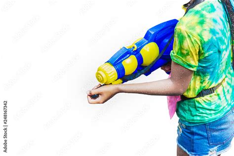 Woman hold Big Water guns for water spray the water party in The traditional Thai New Year ...