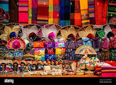 Brightly Colored Han Made Souvenirs Stacked At The Local Market Stall